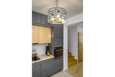 Decoreer Marisa grijze hanglamp met taps toelopende horizontale tussenruimten, maximaal 3 lichtbronnen, diameter 40 cm, 2607
